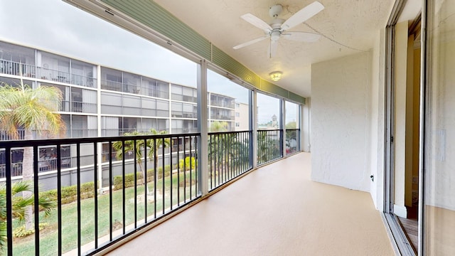 balcony featuring ceiling fan