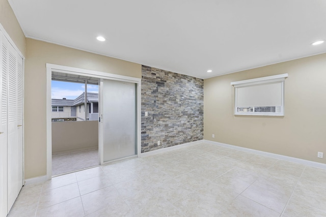 unfurnished room featuring light tile patterned flooring