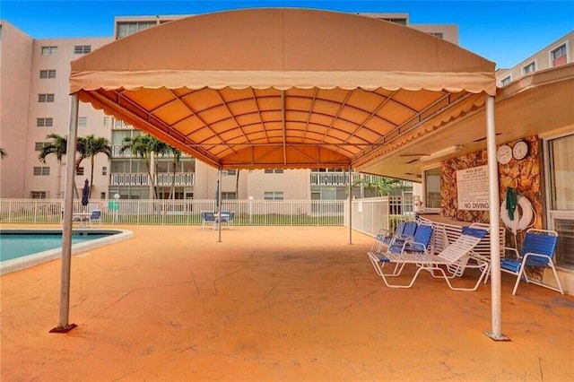 view of pool featuring a patio area