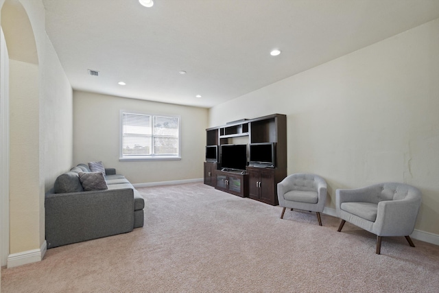 living room featuring light colored carpet