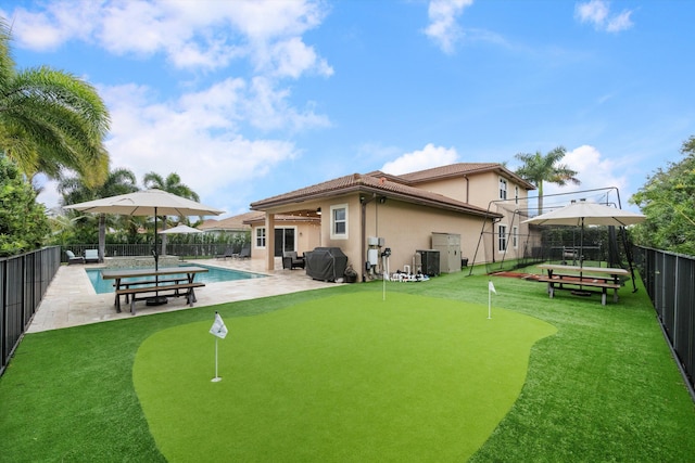 view of community featuring a pool and a patio area