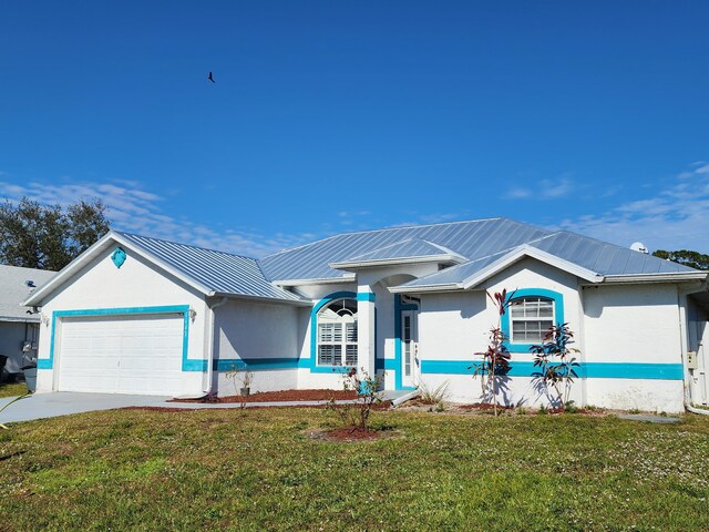 ranch-style home featuring a garage