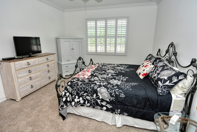 carpeted bedroom featuring ornamental molding