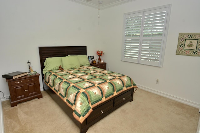 carpeted bedroom with ornamental molding