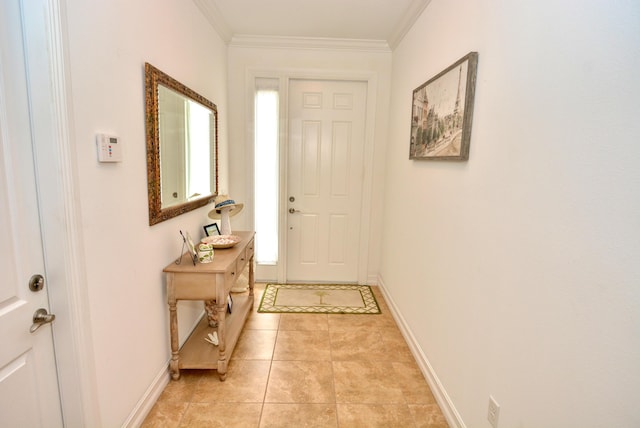 doorway to outside with ornamental molding, a wealth of natural light, and light tile patterned floors