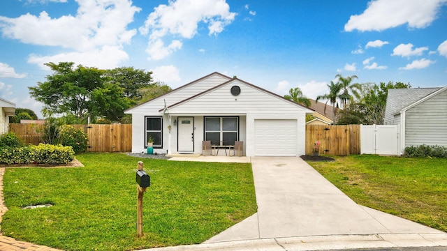 single story home with a garage and a front yard