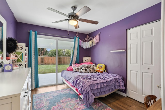 bedroom featuring a closet, light hardwood / wood-style flooring, access to outside, and ceiling fan