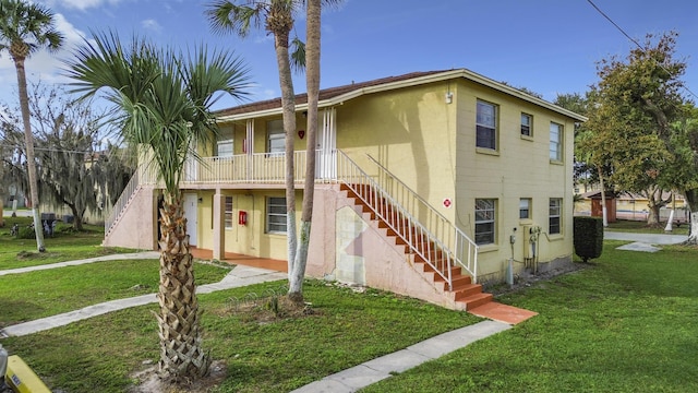 view of property with stairway