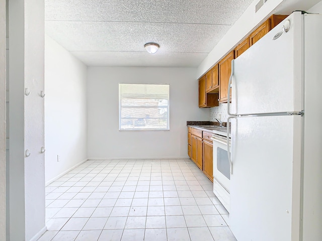 Xx Michigan Court, Saint Cloud, FL 34769 - unfurnished room with light tile patterned floors, baseboards, and a textured ceiling