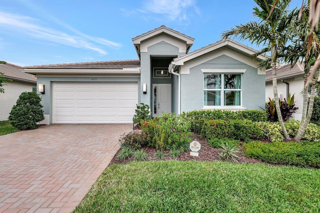 view of front of home with a garage