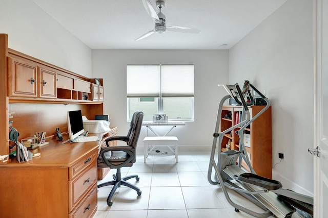 tiled office space with ceiling fan