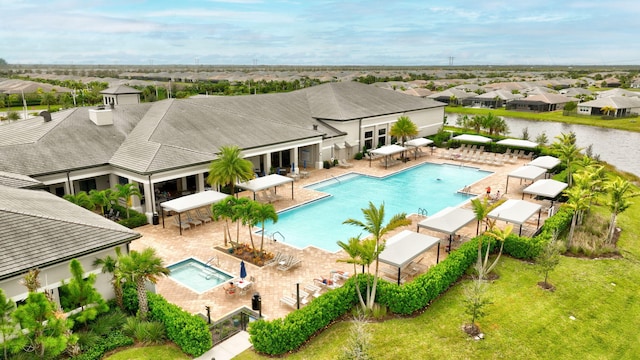 view of swimming pool with a patio