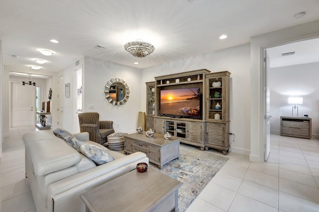 living room with light tile patterned floors