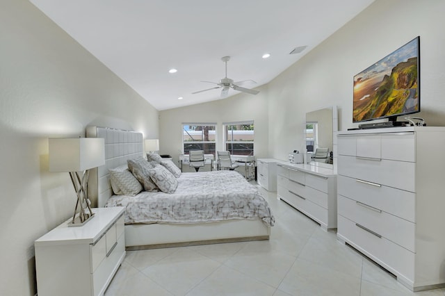 bedroom featuring lofted ceiling, ceiling fan, and light tile patterned floors