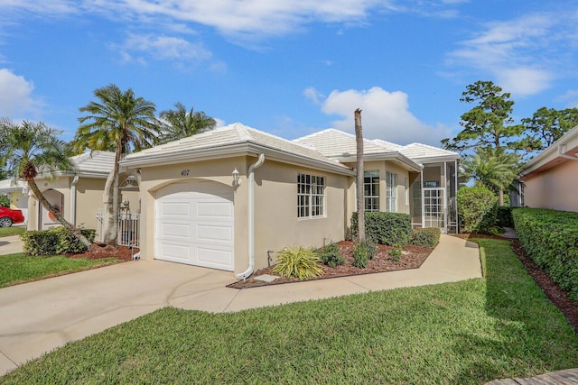 ranch-style home with a front lawn and a garage