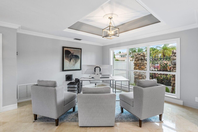 living room with a notable chandelier, a raised ceiling, and ornamental molding