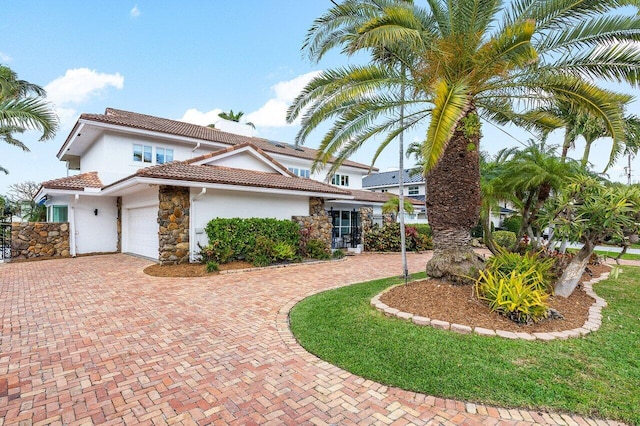 view of front of home with a garage