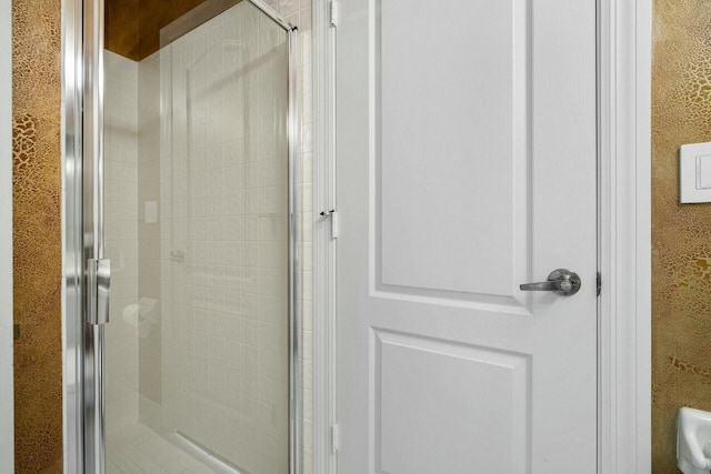 bathroom featuring walk in shower