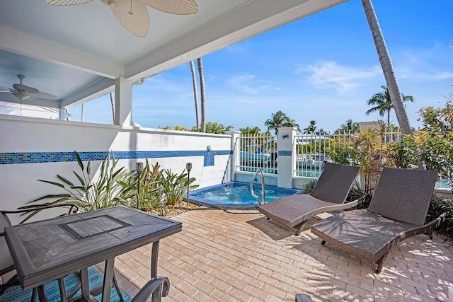 sunroom featuring ceiling fan