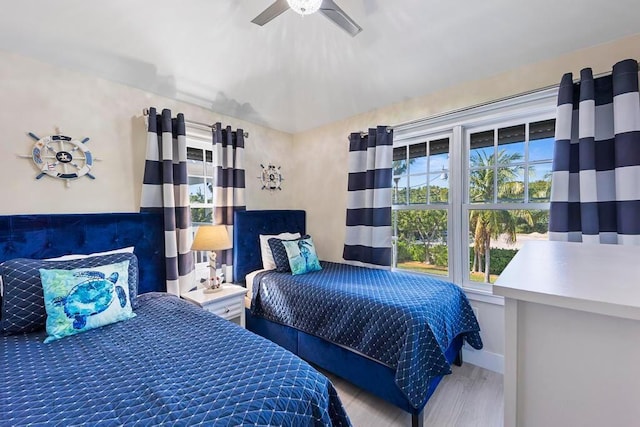 bedroom featuring ceiling fan and hardwood / wood-style floors