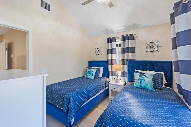 bedroom with vaulted ceiling and ceiling fan