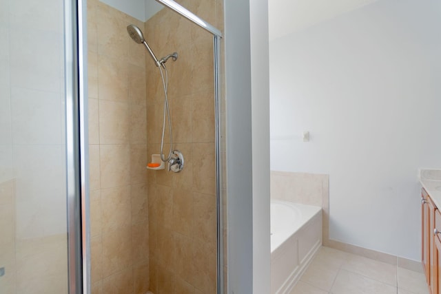 bathroom with vanity, separate shower and tub, and tile patterned flooring