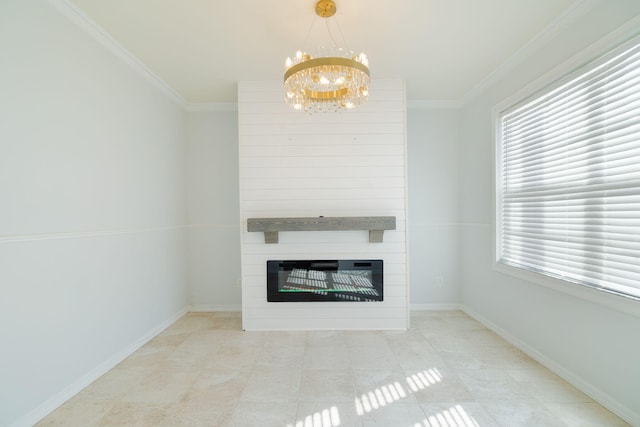 unfurnished living room featuring crown molding, a large fireplace, and an inviting chandelier