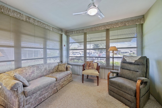 sunroom with ceiling fan