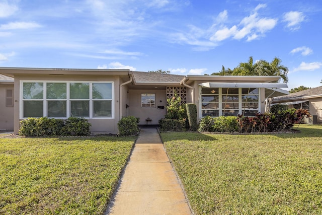 view of front of house with a front yard