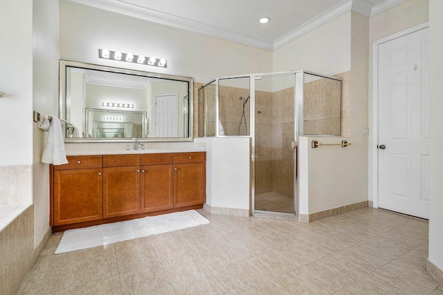 bathroom featuring tile patterned flooring, crown molding, vanity, and shower with separate bathtub