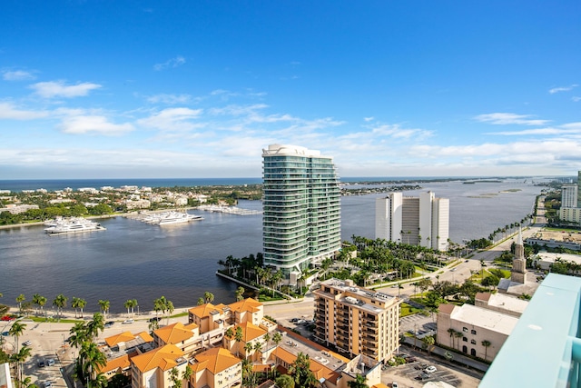 birds eye view of property with a water view