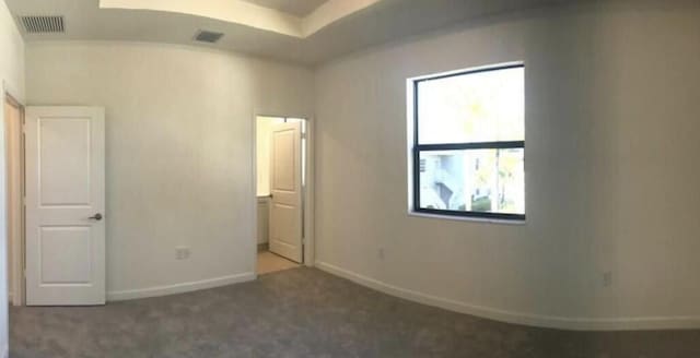 unfurnished bedroom featuring carpet flooring