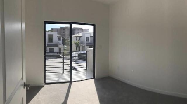 view of carpeted spare room