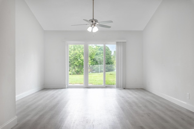 spare room with ceiling fan and light hardwood / wood-style floors