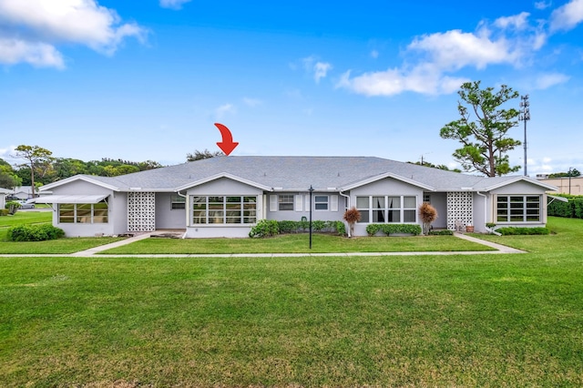 ranch-style home with a front yard