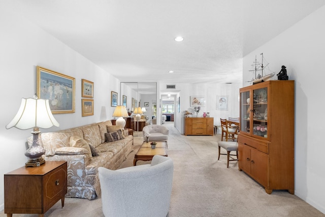 living room with light colored carpet