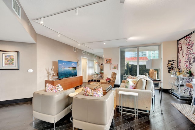 living room featuring dark hardwood / wood-style floors