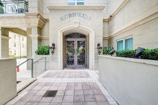 entrance to property featuring french doors