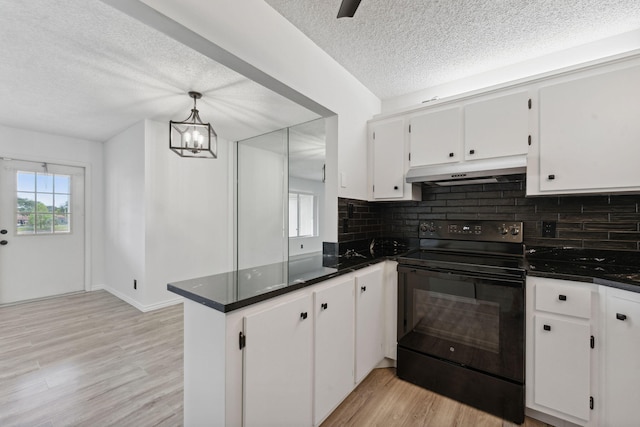 kitchen featuring white cabinetry, black electric range, light hardwood / wood-style floors, kitchen peninsula, and hanging light fixtures