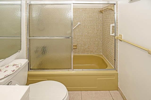 full bathroom with toilet, combined bath / shower with glass door, tile patterned floors, and vanity