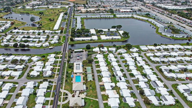 bird's eye view with a water view