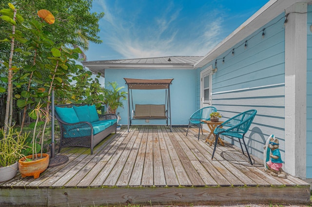 deck featuring an outdoor hangout area