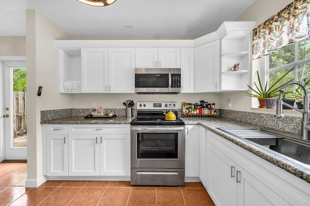 kitchen with white cabinetry, sink, and appliances with stainless steel finishes