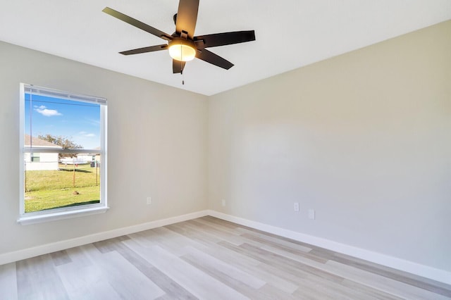 unfurnished room featuring ceiling fan and light hardwood / wood-style flooring