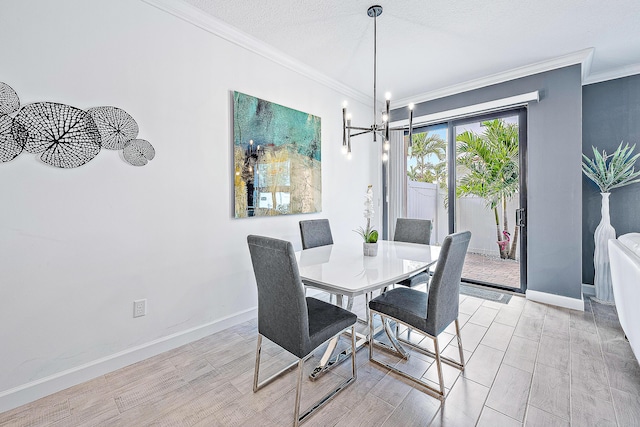 dining room with a textured ceiling, an inviting chandelier, and crown molding