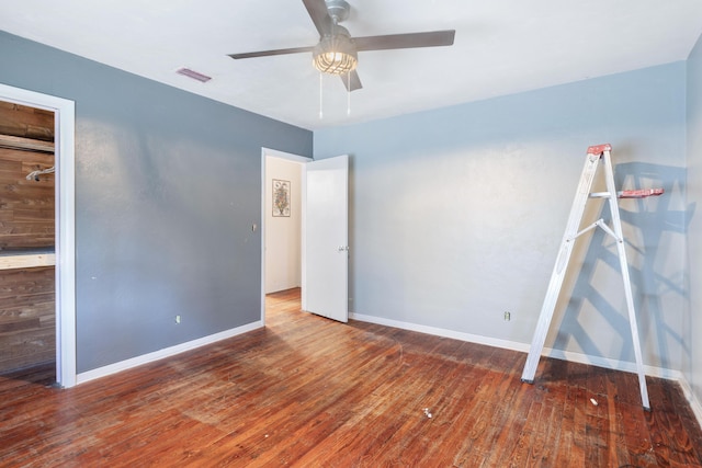 unfurnished bedroom featuring wood-type flooring, a closet, and ceiling fan