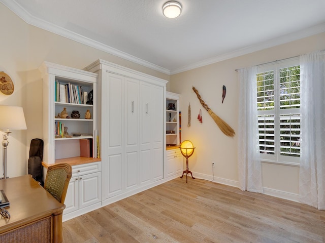 home office featuring light hardwood / wood-style floors and crown molding