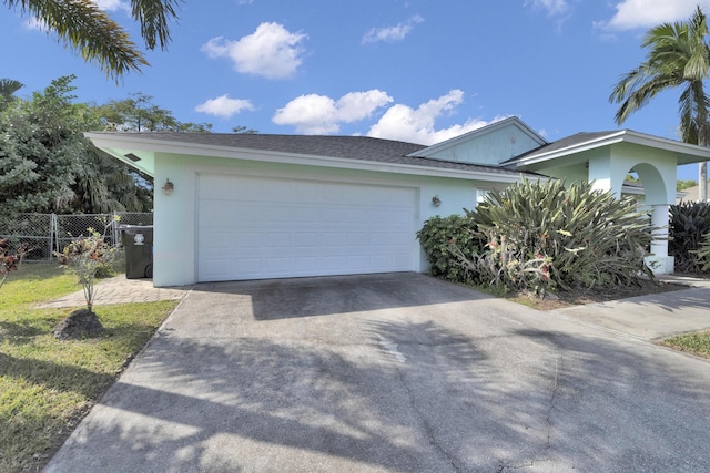 view of front of property featuring a garage