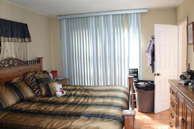 bedroom featuring a textured ceiling