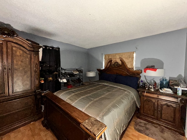 bedroom with a textured ceiling